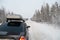 Car trip in winter snowy road