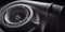 Car turbocharger on black background. Auto part turbo engine technology concept