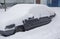 Car under snowdrift.