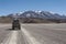 Car in an unpaved Road in Altiplano of the Siloli desert, part of the Reserva Eduardo Avaroa, Bolivia