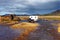 Car wades river in Landmannalaugar, Iceland