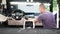 A car wash worker applies detergent to a car seat. Car cleaning concept