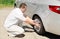 Car wheel defect man change puncture