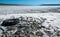 Car wheel on the dried muddy bottom Kuyalnik Estuary, Ukraine