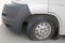 Car wheel flat tire on the road. Small white truck with punctured wheel