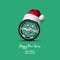 Car wheel in the hat of Santa Claus, on a green background. Congratulations to the car repair shop, car shop