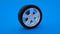 Car wheel isolated on blue background. Alloy wheels tire auto. Minimalist creative concept. 3d illustration