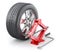 Car wheel with red scissor jack