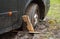 Car wheel stuck in a mud.