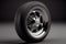 Car wheel with tire - AI generated isolated on black background