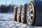 a car wheels on the background of a winter snow-covered forest, beautiful landscape, a concept of traffic safety on a