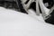 Car wheels stuck in deep snow, after a heavy snowfall, close-up.Snow cyclone.