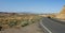 Car on winding desert Road