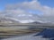 Car window view of a flat gravel basin, Pamir Highlands, Xinjiang, China