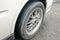 Car with worn bald tire unsafe and poses accident risk