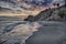 Carabeo beach at sunset with fishing hut, Nerja, Spain