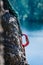 Carabiner between two ropes on a rock