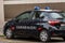 a carabinieri car parked in front of the court