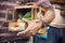 Caracas, Dtto Capital / Venezuela 03-28-2013 : man carries in his hands a caged parrot that gives luck