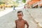 Caracas, Venezuela - 20 june 2018: potrait of malnourished venezuelan child playing in the streets half during economic