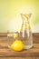 Carafe with mineral water and lemon
