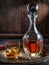 Carafe of whisky and glass of whisky on old wooden cask at the dark background