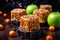 caramel apple treats with halloween-themed sprinkles