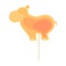 Caramel candy on a stick in the form of a large hippopotamus.