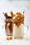 Caramel and chocolate crazy freakshake milkshakes with brezel waffles, popcorn, marshmallow, ice cream and whipped cream.
