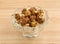 Caramel Coated Popcorn With Peanuts On Counter Top