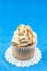 Caramel Cupcake On Blue Background