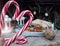 Caramel heart on the background of a festive composition and new year`s gifts, close - up-the concept of the arrival of your