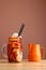 Caramel milkshake with coffee on wooden table. Salted caramel ice cream sundae. Cold coffee drink frappe frappuccino , with