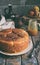 Caramel monkey bread. Apple pie with brown sugar and cinnamon on a wooden background. Autumn baking. Homemade sweets. Rustic style