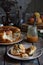 Caramel monkey bread. Apple pie with brown sugar and cinnamon on a wooden background. Autumn baking. Homemade sweets. Rustic style