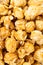 Caramel popcorn texture background. Sweet caramel popcorn close-up