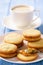 Caramel shortbread cookies on wooden background.