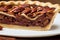 Caramel sweet tart pecan pie with nuts in section on plate