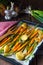 Caramelised carrots, spring onions and baked potatoes