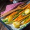 Caramelised carrots, spring onions and baked potatoes