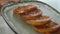 Caramelizing orange slices for chocolate mousse with orange jelly