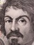 Caravaggio face on 100000 italian lire banknote close up. One of