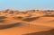 Caravan of Camels in Erg Chebbi Sand dunes near Merzouga, Morocco