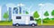 Caravan car family trailer truck driving on road recreational travel vehicle camping concept wind turbines cityscape