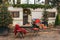 Caravan mobile home with terrace, Mobile home decorated with Christmas decor. Festive atmosphere - lights, red blankets, Christmas