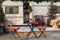 Caravan mobile home with terrace, Mobile home decorated with Christmas decor. Festive atmosphere - lights, red blankets, Christmas