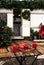 Caravan mobile home with terrace, Mobile home decorated with Christmas decor. Festive atmosphere - lights, red blankets, Christmas