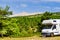 Caravan in mountains. Mont Ventoux in the distance. Provance