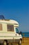 Caravan with open sunroof, raisable window on roof top