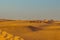 Caravan with tourists among the sand dunes of the desert close up. Dubai 2019.